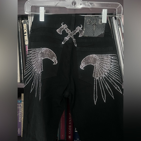 silver dagger Denim - Deadstock silver dagger
Black Jeans with White studded eagle Detailing